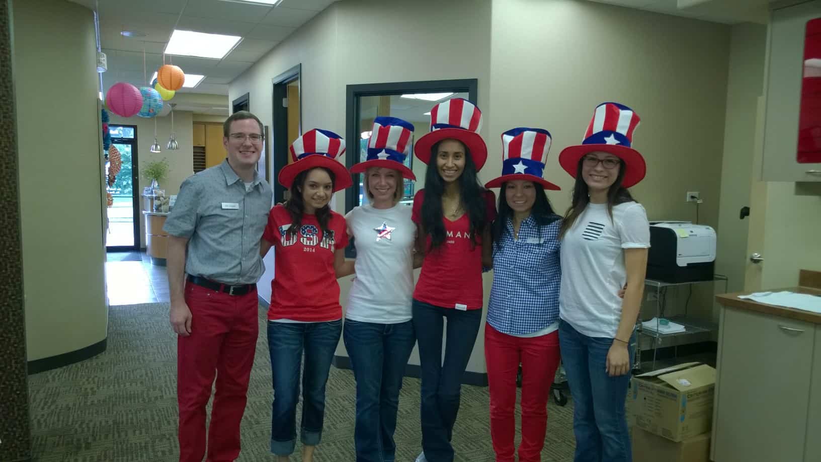 Team members wearing USA hats