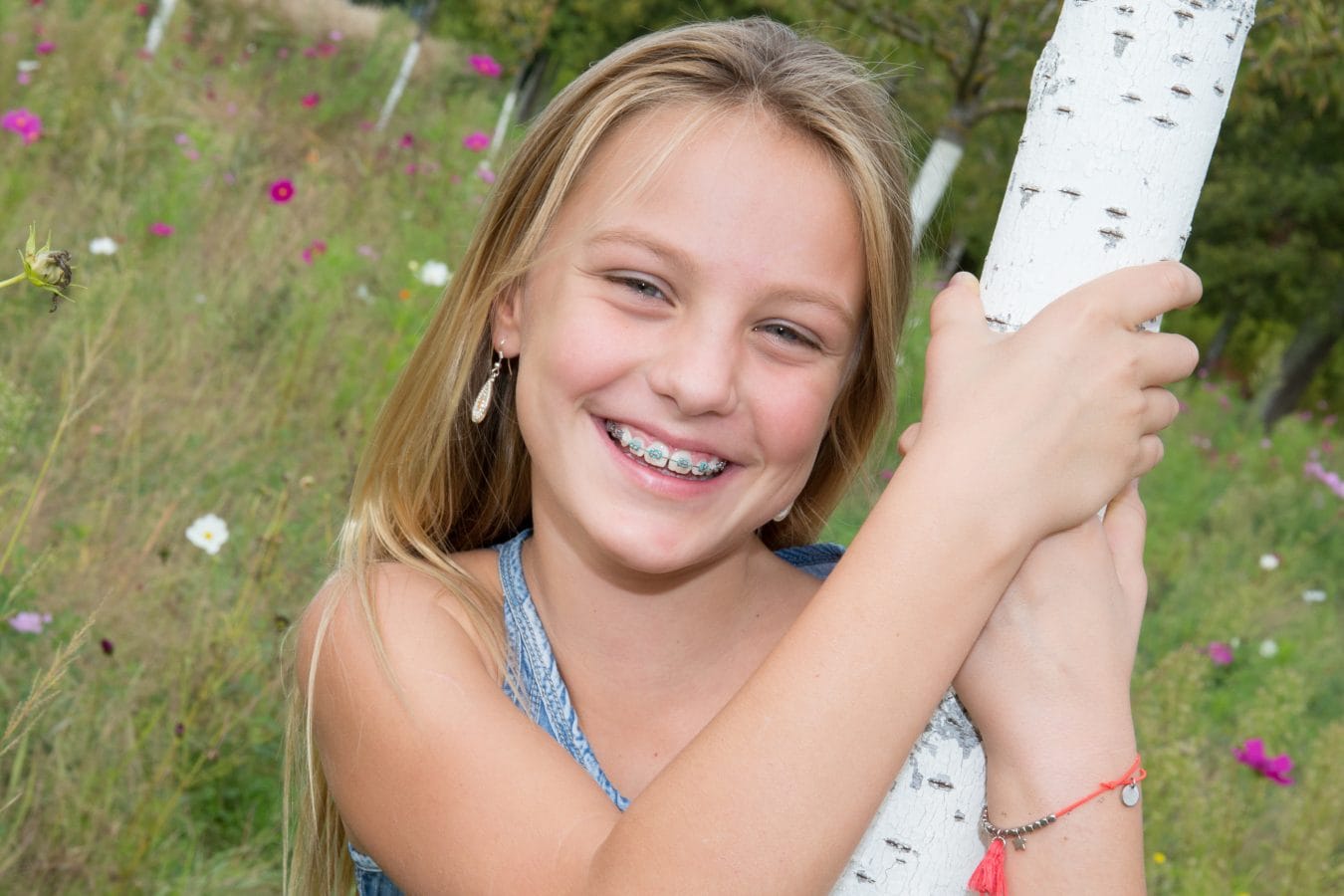 Young girl outside smiling